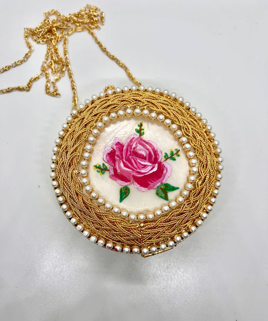 Mother of pearl clutch - round